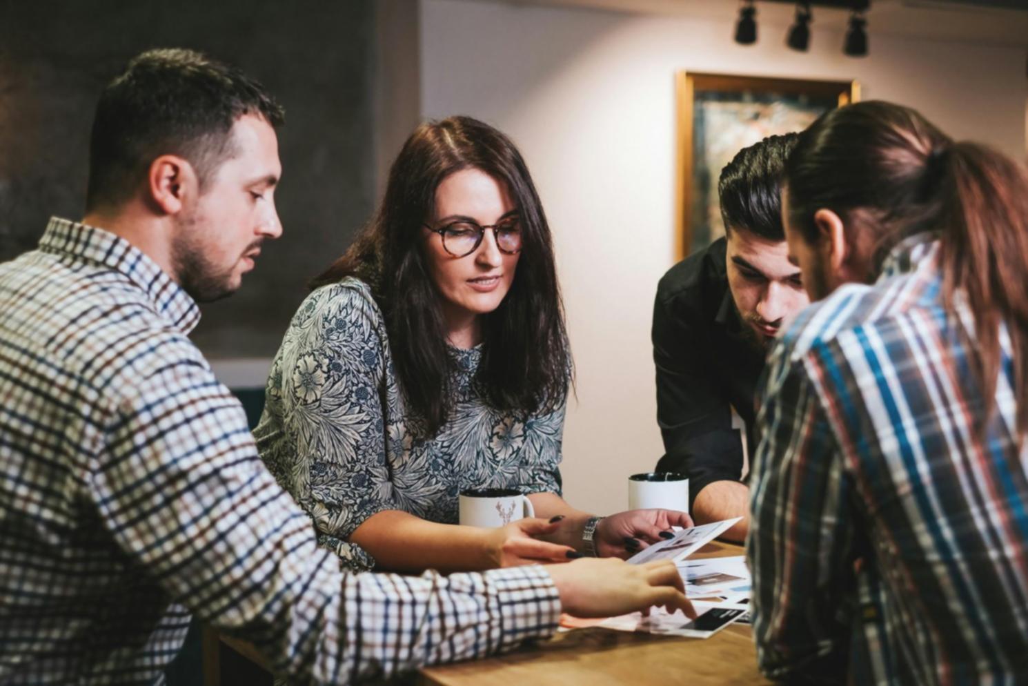 Diverse group of entrepreneurs networking and sharing business insights
